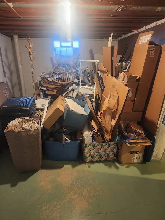 Roll-off dumpster container at job site for 6 Yard Dumpster Rental in Lindstrom